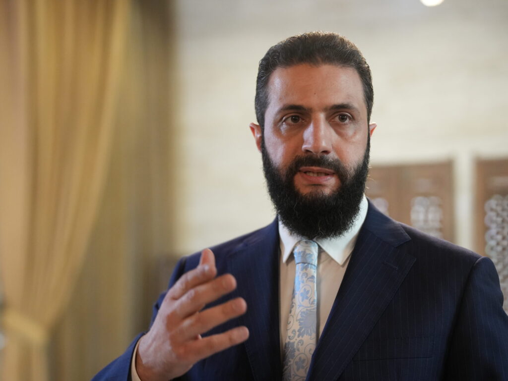 epa12659576 Syrian President Ahmed al-Sharaa after signing an agreement at the presidential palace in Damascus on January 18, 2026. President Ahmed al-Sharaa announced that an agreement had been reached with the commander of the predominantly Kurdish Syrian Democratic Forces, which includes a ceasefire. EPA/